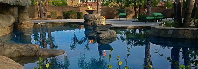 Pool with fire pits surrounding it, creates an environment for all seasons.